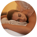 Massage & bodywork scene with warm light and calm colors, symbolizing fascia release and nervous system reset.