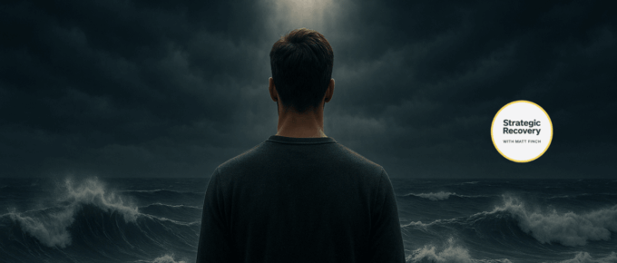 A person standing calmly before stormy ocean waves under dark clouds with light breaking through, symbolizing mastering addiction recovery triggers and relapse prevention.