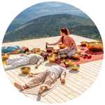 Crystal bowls and headphones merging into waves of color, symbolizing sound healing and binaural beats.