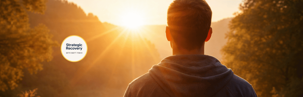 Man standing outdoors at sunrise receiving morning sunlight, symbolizing circadian rhythm repair and natural dopamine regulation in addiction recovery.