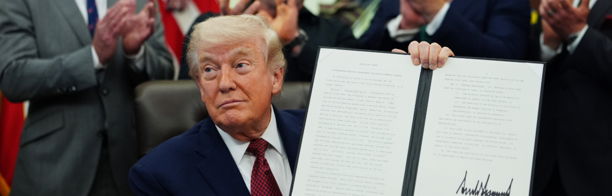 Trump showing signed executive order with Joe Rogan and others in the background, to fast-track psychedlics by giving $50 million to FDA for making ibogaine, psilocybin and other psychedelics available.